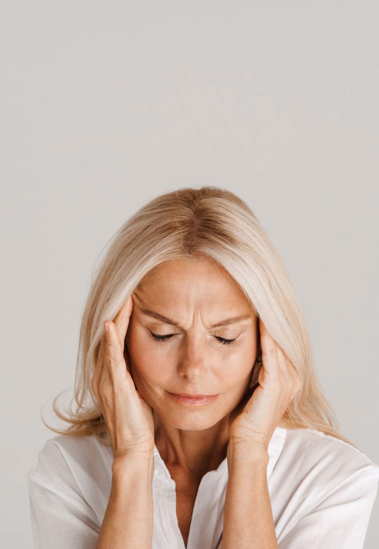 Woman with a migraine headache